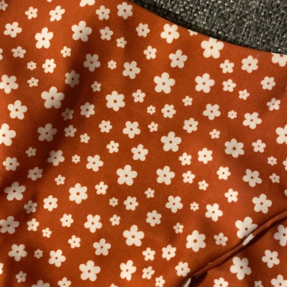 Swimsuit set. Burnt orange with white flowers. Top xsmall and bottom small. - Picture 4 of 6
